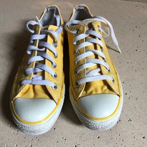 Yellow low converse kick around shoes